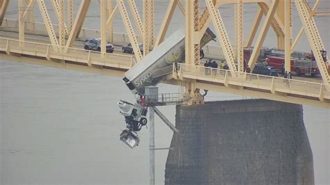 Semi-truck driver takes off after striking bridge, damaging Georgetown home